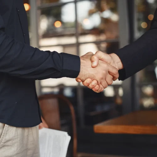 men-shake-hands-enclosure-business-agreement-understanding-business-partners